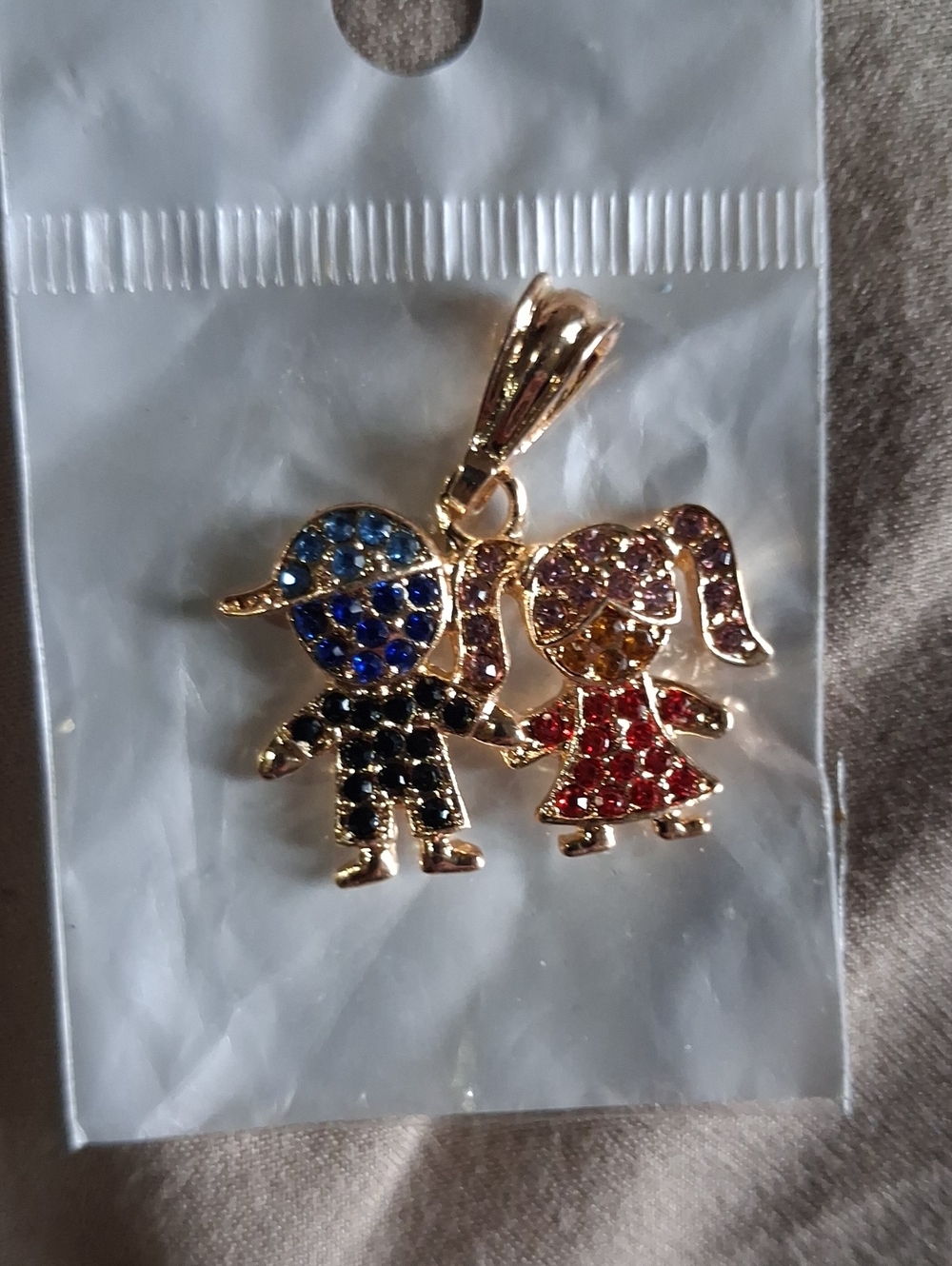Gold-Tone Boy and Girl Pendant with Multi-Colored Rhinestones